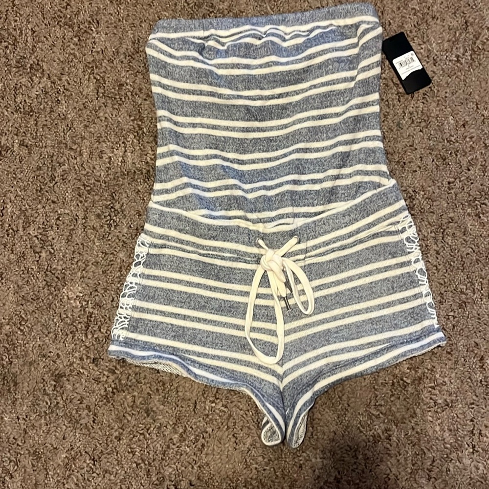 Brand new Guess romper towel material size small